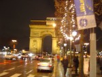 The Arc de Triomphe at night.