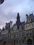 The Hotel de Ville - Paris City hall. The images are of two French journalists who were hostages in Iraq at the time.