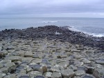 The mostly six-sided (but also four, five, seven and eight-sided) stones were created by the cooling and shrinking, along regular lines of force, of molten lava from a vast volcanic eruption.
